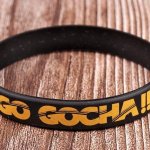 Браслет силиконовый "GO GOCHA!!!", черный, желтая надпись