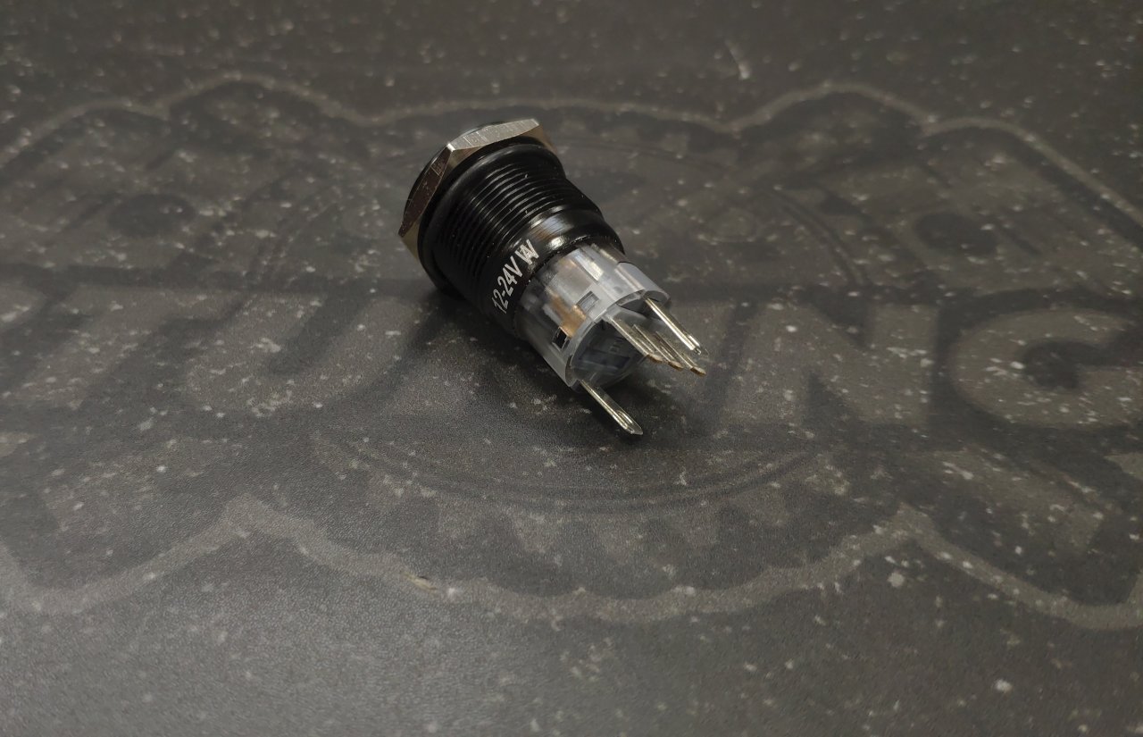 Кнопка черная с фиксацией водонепроницаемая 12В 3А - белая подсветка
