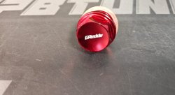 Пробка M20*1.5 сливная с магнитом Greddy, красная