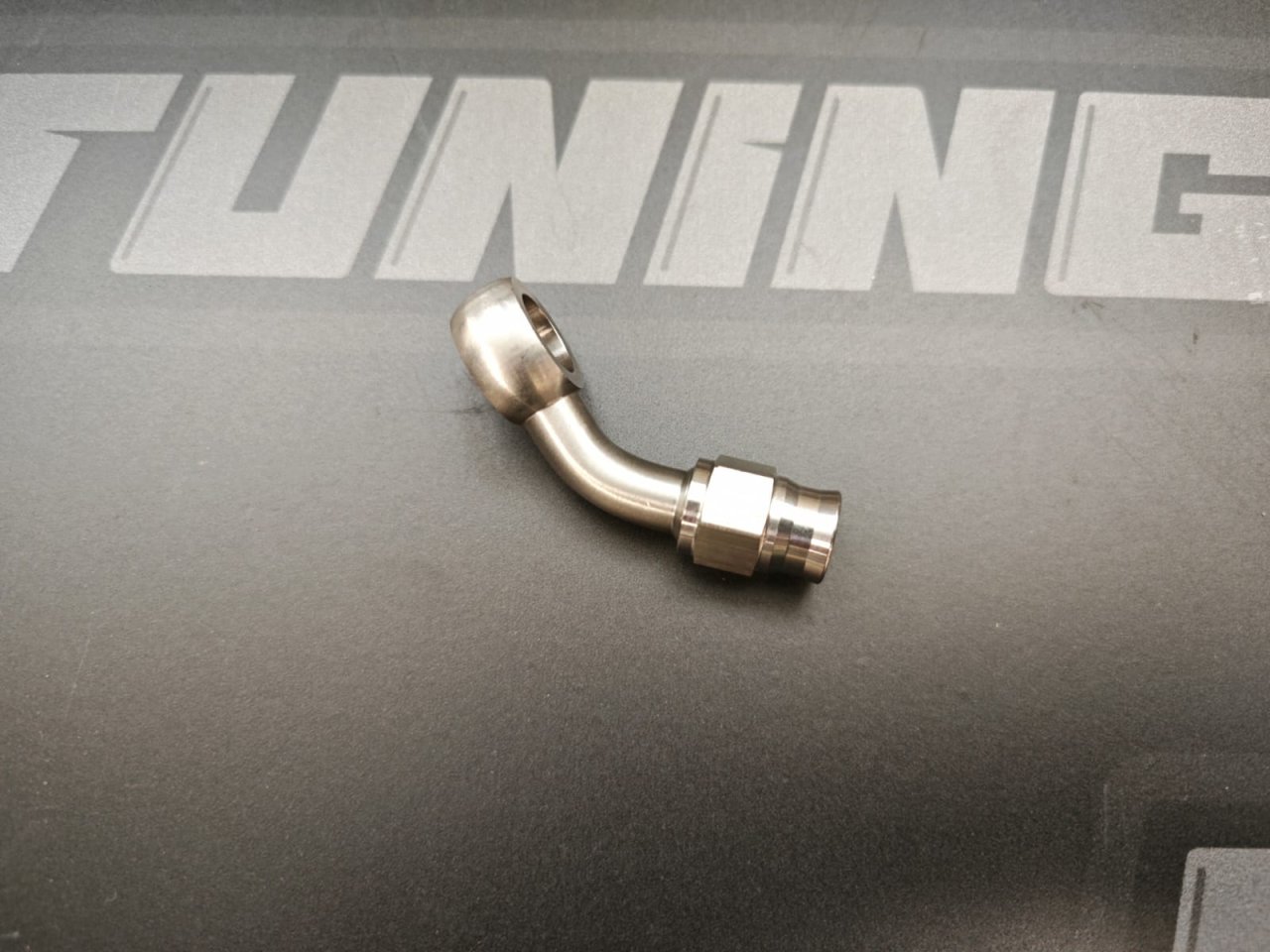 Фитинг BANJO AN3 - 10,2мм, 45 градусов, под тефлоновый шланг PTFE, нержавейка 201