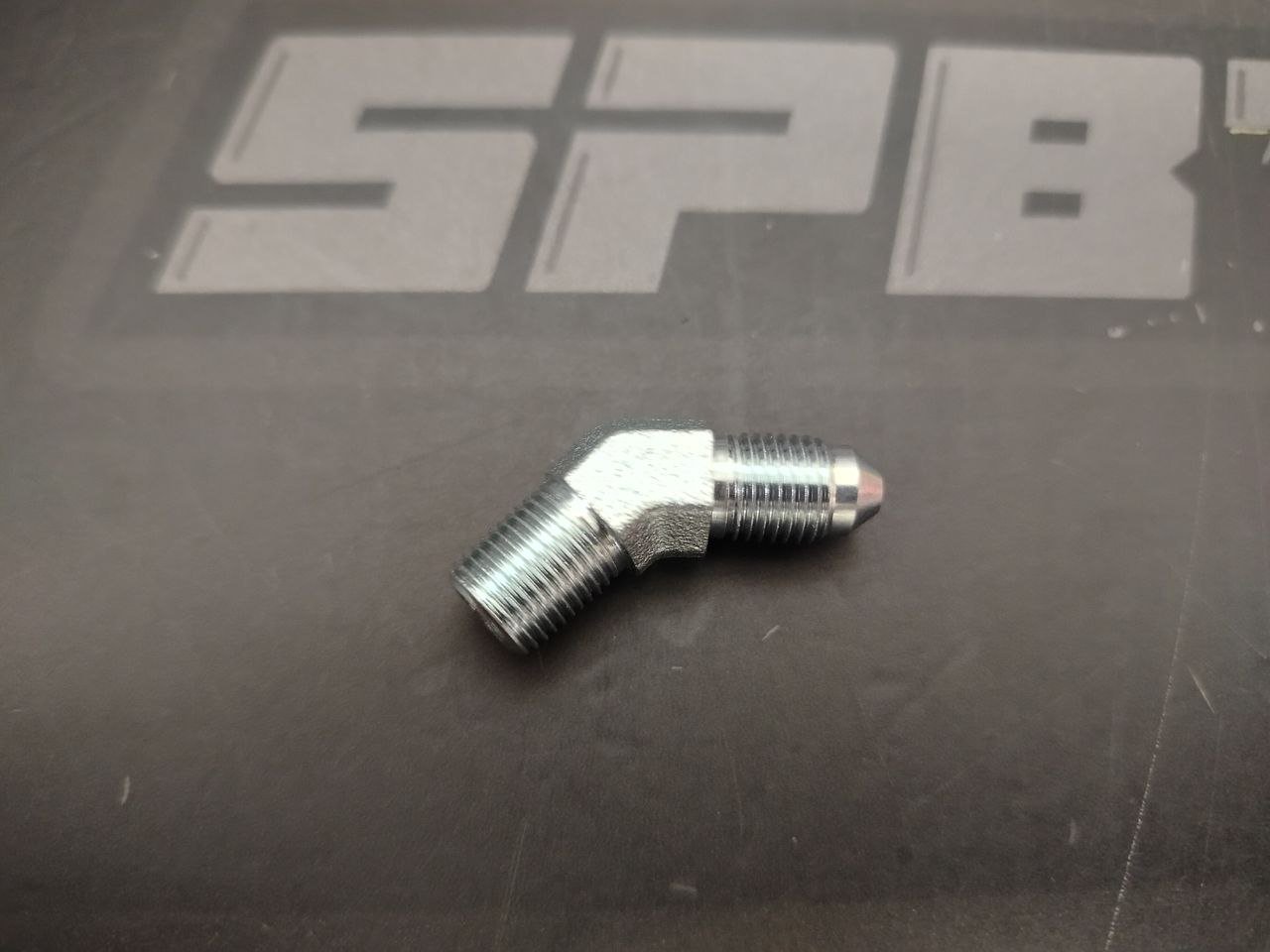 Фитинг AN3 - 1/8" NPT 45 градусов, сталь