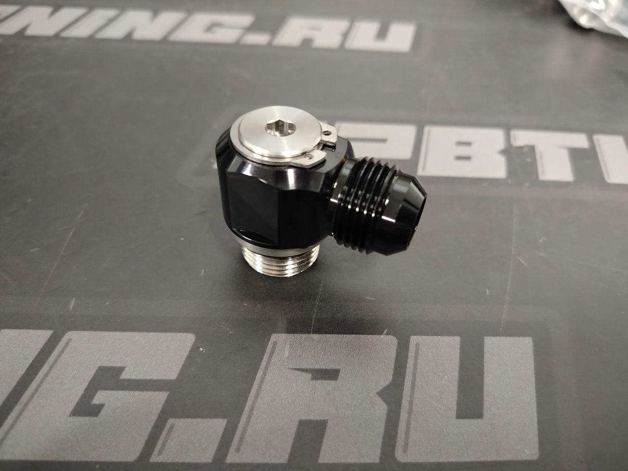 Фитинг orb10 - an10 поворотный, 90градусов 